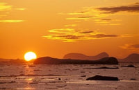 Sunset over the Antarctic Peninsula poster print by Pete Oxford