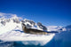 Leopard Seal resting on iceberg in Antarctica by Paul Souders