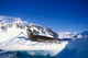 Leopard Seal resting on iceberg in Antarctica poster print by Paul Souders.