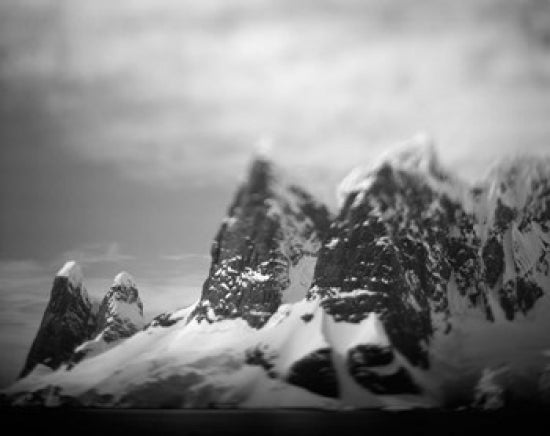 Antarctica mountain peaks along Cape Renaud poster print by Paul Souders.