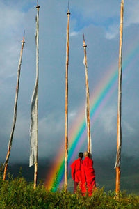 Rainbow and Monks with Praying Flags Poster Print by Keren Su featuring Bhutan's Phobjikha Valley.