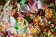 Colorful Crispy Rice Crackers as Sacrificial Offerings Poster Print by Keren Su