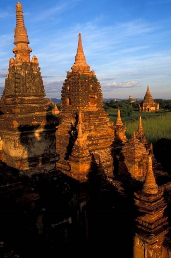 Ancient Temples and Pagodas at Sunrise poster print showcasing Myanmar's beauty.