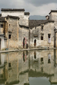 Half Moon Pond in Hong Cun Village, Yi County, China poster print by Adam Jones