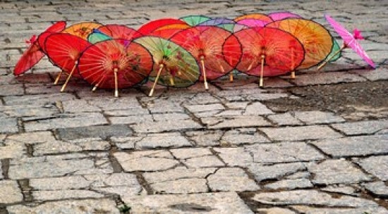 Umbrellas for Sale on the Streets of Jinan Poster Print by Bruce Behnke