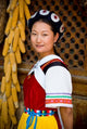 Naxi Minority Woman in Traditional Ethnic Costume Poster Print by Charles Crust