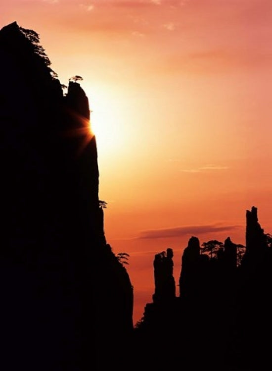 Sunburst on Craggy Huangshan Peaks poster print by Charles Crust, showcasing the beauty of Huangshan mountains in Anhui, China.