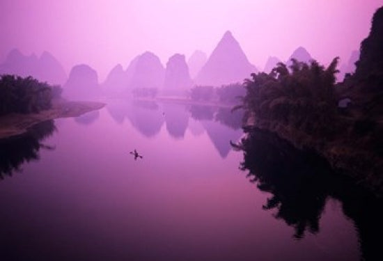 Poster print of a fisherman on a raft in Li River, Yangshou, Guanxi, China.