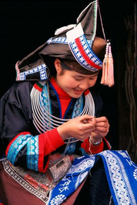 Tip-Top Miao Girl Doing Traditional Embroidery Poster Print by Keren Su