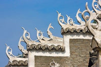 Traditional house with upturned eaves in Zhenyuan, Guizhou, China poster print