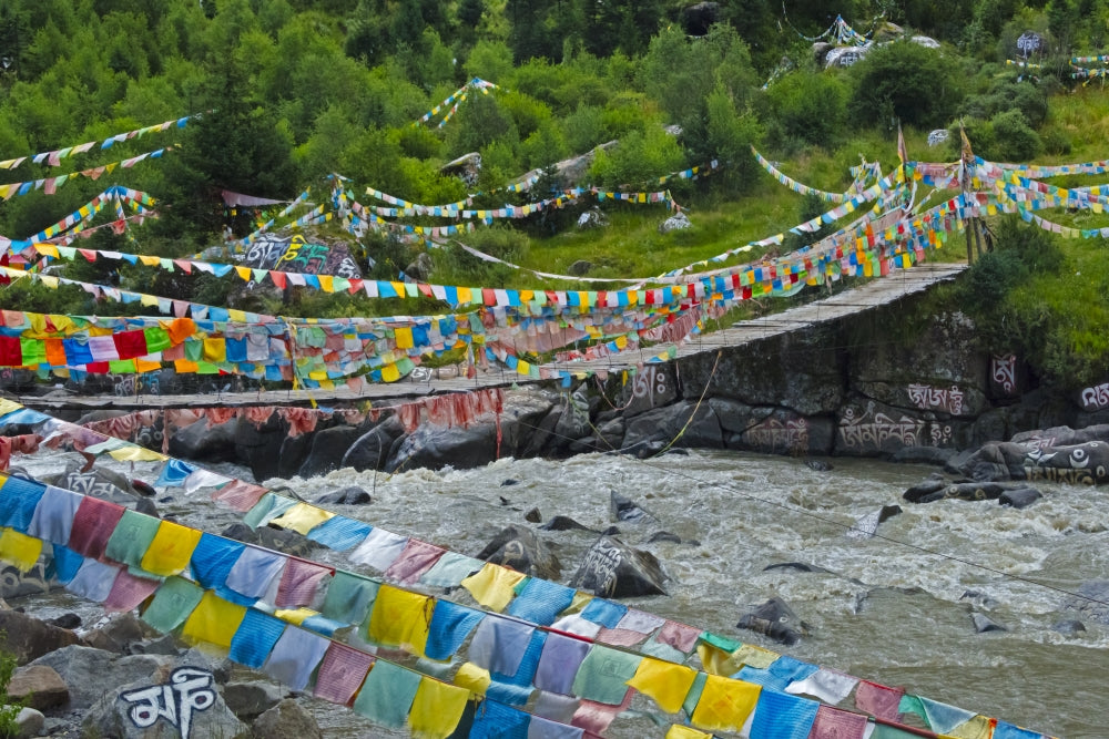 Praying Flags Across the River Poster Print by Keren Su, vibrant prayer flags in Tagong, Sichuan.