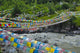 Praying Flags Across the River Poster Print by Keren Su, vibrant prayer flags in Tagong, Sichuan.