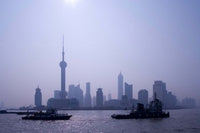 Poster print of water traffic on Huangpu River with Oriental TV Tower and Pudong skyline in Shanghai, China.