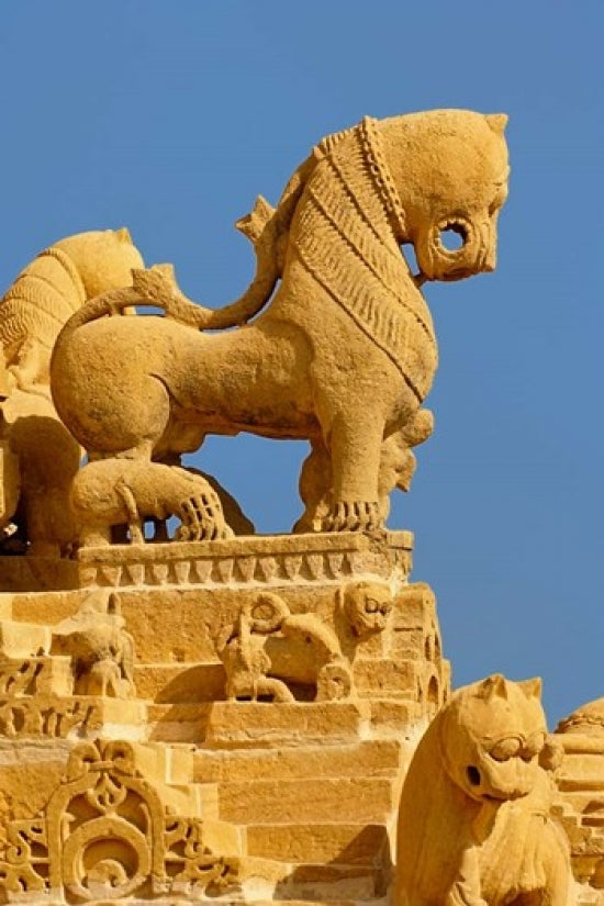 Carved figures on Jain Temple, Jaisalmer, India poster print showcasing intricate architecture.