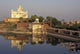 Temple Reflection and Locals, Rajasthan, India poster print by Claudia Adams