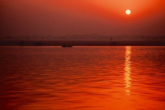 Sunset over the Ganges River in Varanasi, India Poster Print by Dee Ann Pederson