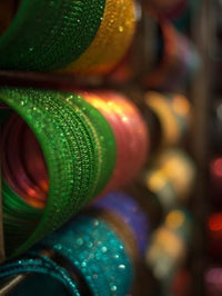 Bangles stacked in a store in Bangalore, Karnataka, India - Poster Print