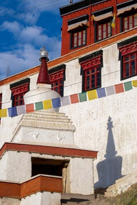 Prayer flags and chorten at Thiksey Monastery in Leh, Ladakh, India.