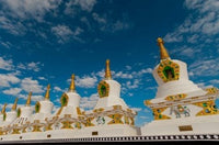 Chortens at Thiksey Monastery poster print showcasing stunning Ladakh scenery.
