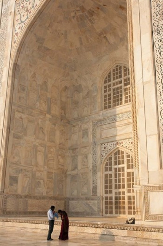 Visitors dwarfed by the Taj Mahal poster print by Inger Hogstrom