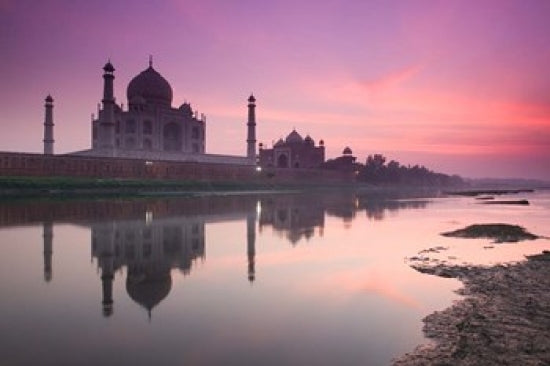 Taj Mahal at dusk along the Yamuna River poster print by Walter Bibikow.