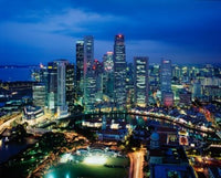 Aerial View of Singapore at Night Poster Print by Paul Thompson