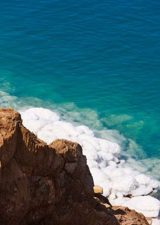 Deposit of salt and gypsum by the cliff in Dead Sea poster print by Keren Su
