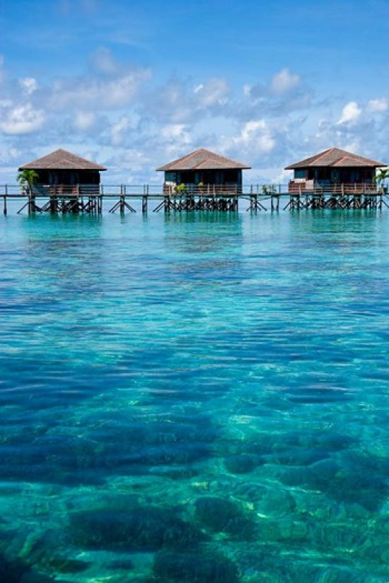 Bungalows at Sipadan-Kapalai Dive Resort Poster Print by Ali Kabas