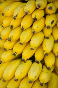 Local Bananas for Sale Poster Print featuring the Dhofar Region, Oman by Walter Bibikow.