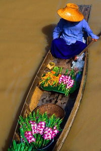 Floating Market at Damnernsaduak near Bangkok fine art print showcasing colorful boats and serene water.