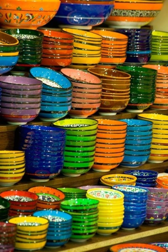 Colorful bowls and plates on display at Istanbul Spice Market poster print by Darrell Gulin.