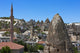 Houses and churches carved into rock formation in Goreme, Cappadocia, Turkey Poster Print by Keren Su.