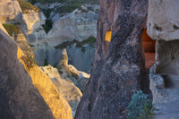 Houses carved into the rock formations in Goreme, Cappadocia, Turkey Poster Print by Keren Su