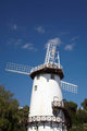 Windmill at Penny Royal World poster print by David Wall, showcasing an iconic Australian windmill.