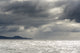 Dramatic Tasmania storm clouds and sun horizon poster print by Trish Drury.