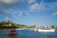 Castle Hill Boats and Seaplane Poster Print by Walter Bibikow