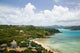 Whitsunday coastline poster print by Walter Bibikow showcasing vibrant tropical landscape.