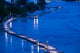 Evening View of a Pontoon Bridge Over Brisbane River poster print by Walter Bibikow