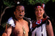New Zealand Maori culture poster print by Bill Bachmann showcasing colorful traditional attire.