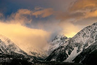 Sunrise at Aoraki Mount Cook Poster Print by David Noyes, showcasing vibrant colors and majestic peaks.