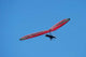 Hang Glider Over Otago Peninsula Poster Print by David Wall