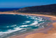 Tautuku Bay poster print by David Wall showcasing a serene New Zealand landscape.