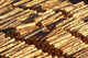 Log Stacks in Marlborough Sounds, South Island, New Zealand Poster Print
