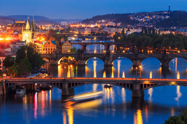 Prague sunset poster print featuring city and river bridges by Jaynes Gallery.