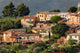 View of Roussillon, France Poster Print by Adam Jones showcasing vibrant colors and landscapes.