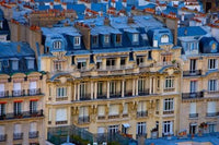 The Louvre Museum at Twilight Poster Print showcasing Parisian architecture at sunset.
