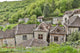 Saint-Cirq Lapopie Rooftops Poster Print by Hollice Looney