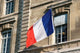 French Flag Facade of Justice Palace Paris Poster Print