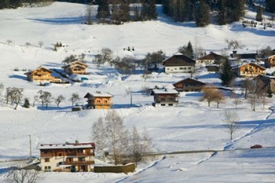 Ski Village in Winter Poster Print by Walter Bibikow showcasing ski chateaus in a snowy landscape.