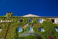 Le Abbaye Hotel Poster Print by Walter Bibikow showcasing elegant architecture.